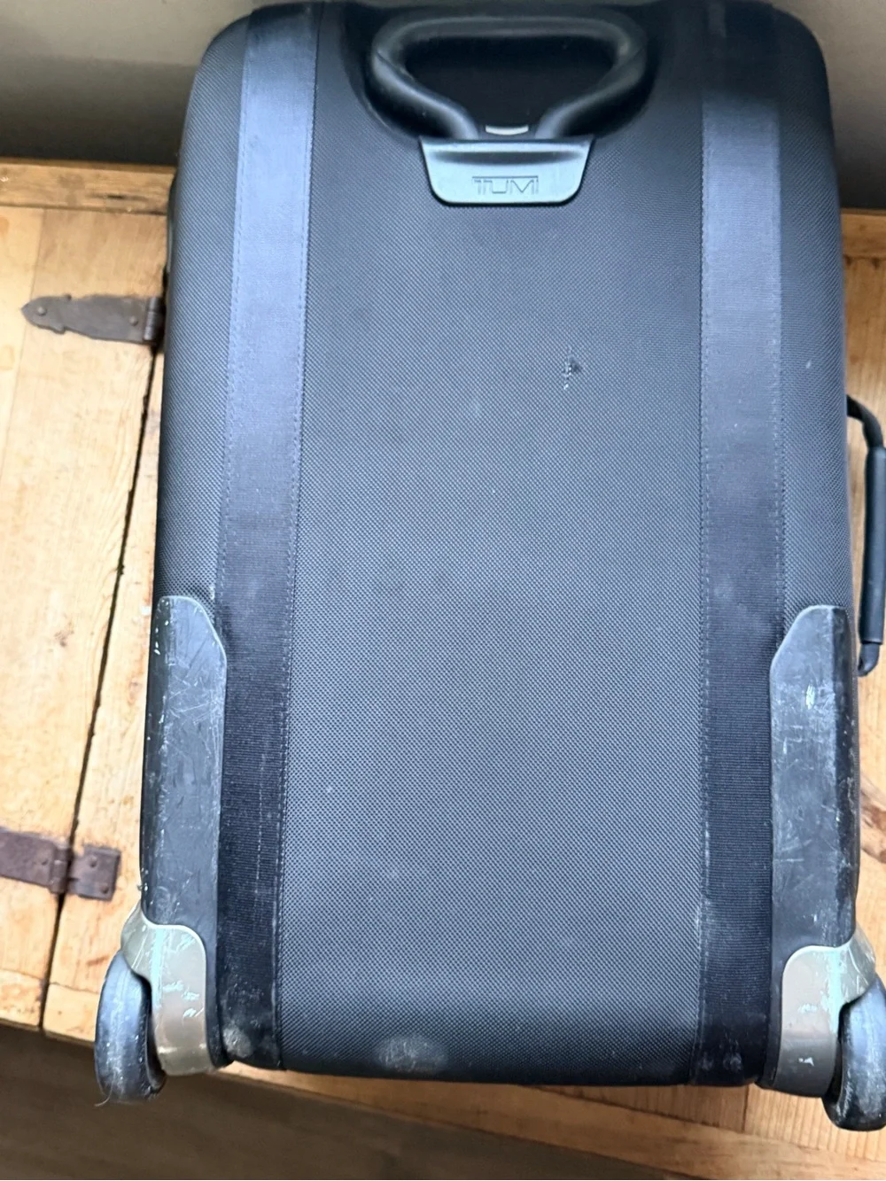 Tumi Black Rolling Suitcase with Front Pocket